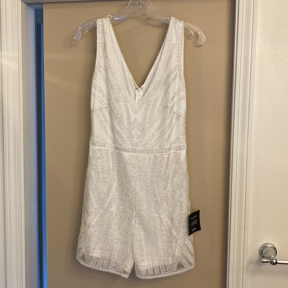 White beaded sleeveless romper